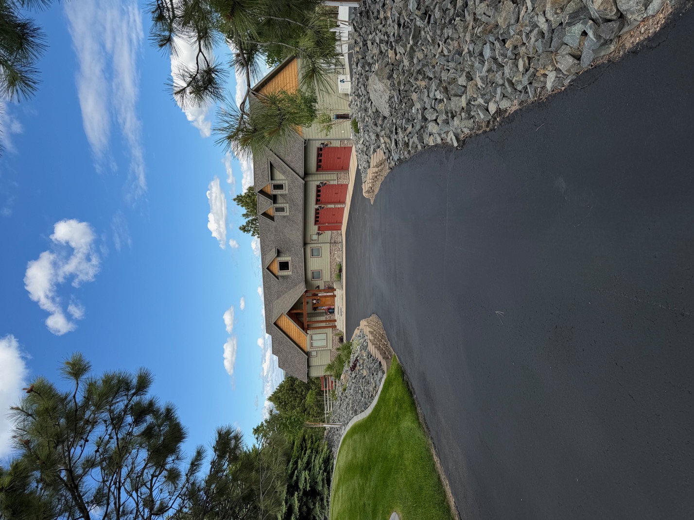 Freshly sealcoated asphalt driveway in Helena Montana